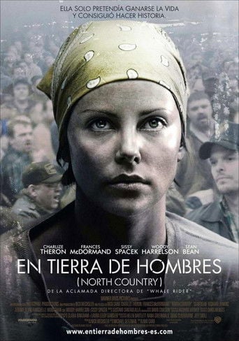 En tierra de hombres poster